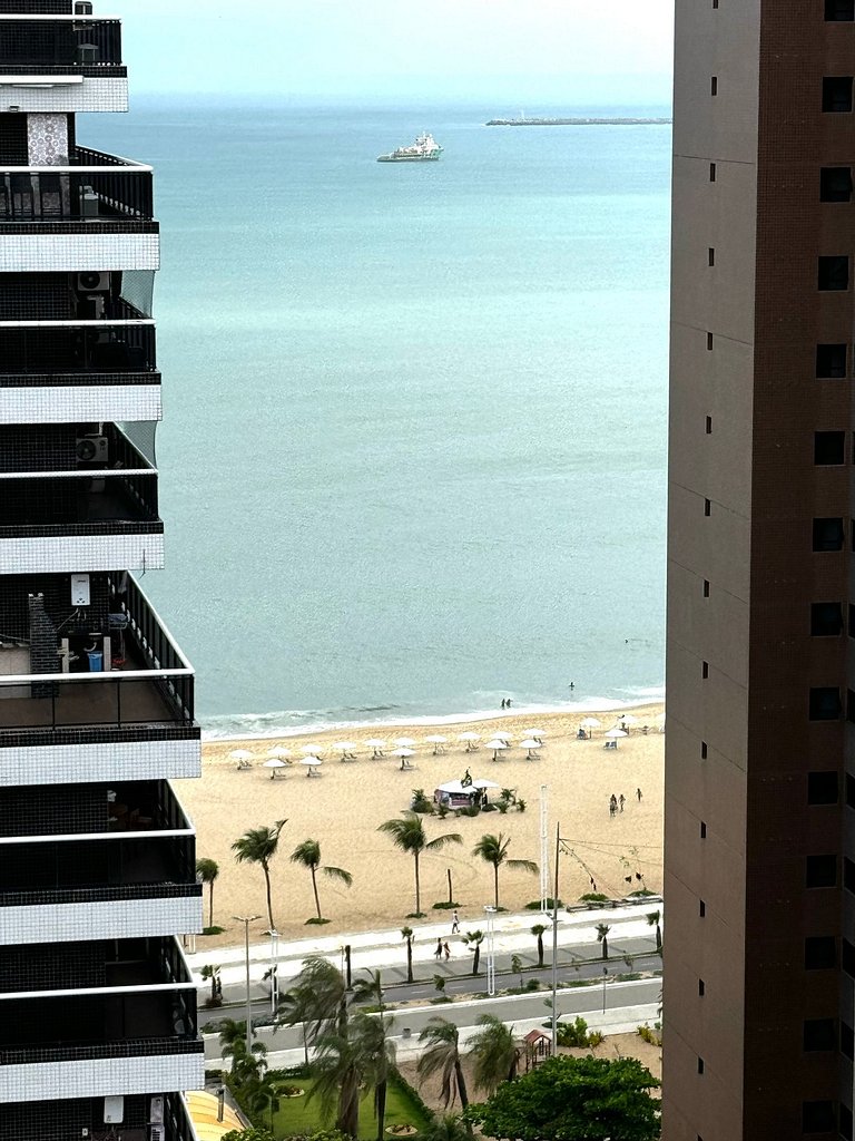 Quarto triplo vista mar